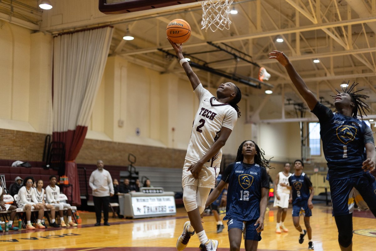 Basketball player going up for a layup